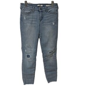 Vintage America Women's Distressed Blue Jeans. Boho skinny ankle